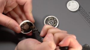 AirTag 2 has a thinner motherboard, bigger speaker coil, and lots of glue