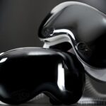 Two sleek black-and-white mixed reality headsets with glossy curved fronts and visible cameras, resting together on a dark surface against a dark background.