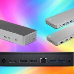 Several gray USB docking stations and a black port-filled rear panel float against a vibrant rainbow gradient background, emphasizing multiple HDMI, USB, Ethernet, and audio connections
