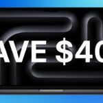 Open MacBook Pro laptop with dark abstract screen pattern on a blue background, overlaid by large bold white text reading SAVE $400, suggesting a promotional discount offer.